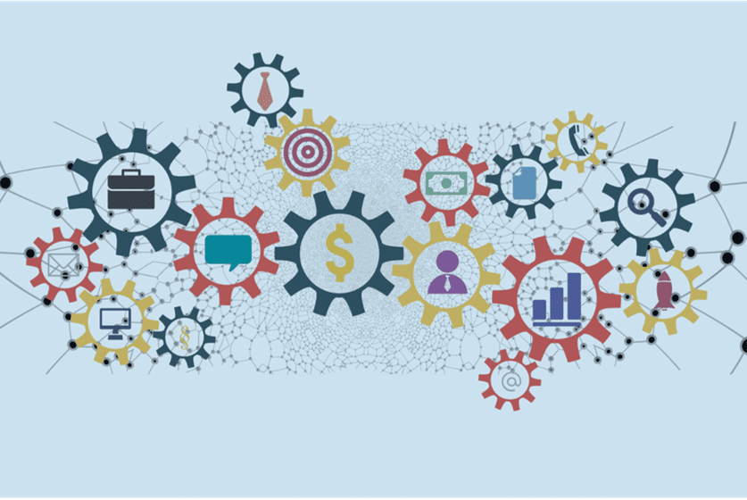Illustration of interconnected gears with various icons, including a dollar sign at the center, a target, a briefcase, a computer monitor, pie charts, and currency symbols. The gears represent leadership and strategy as they are connected by a network of lines and nodes on a light blue background.